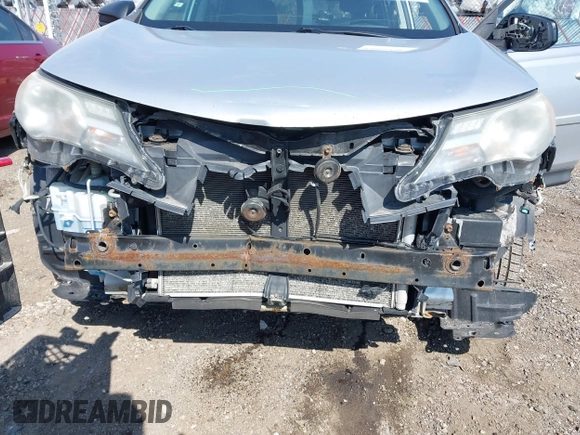 2014 Toyota RAV4 LE with VIN 2T3BFREV4EW136537, listed as a IAAI auction lot 42065728 with 211,039 mi miles and . Bid and sale history available at DreamBid. Image 6.