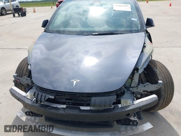 2023 Tesla Model 3 with VIN 5YJ3E1EA7PF417293, listed as a IAAI auction lot 42407659 with 22,578 mi miles and . Bid and sale history available at DreamBid. Image 10.