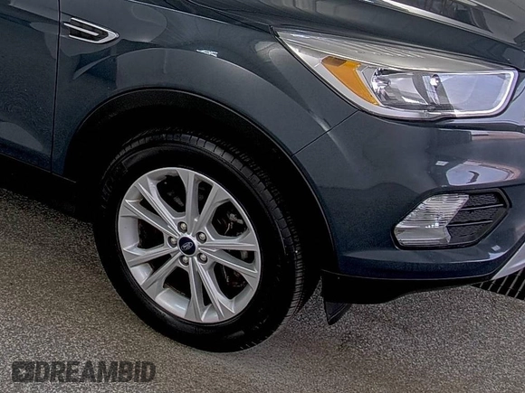 2019 Ford Escape SE z VIN 1FMCU9GD9KUA54757, wystawiony jako IAAI lot #42516631 z przebiegiem 87 040 mil mil oraz . Historia ofert i sprzedaży dostępna na DreamBid. Obrazek 8.