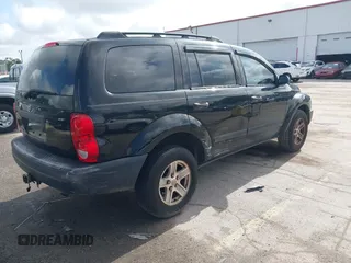 2006 Dodge Durango SXT with VIN 1D4HD38N26F107701, listed as a IAAI auction lot 42469231 with 259,022 mi miles and . Bid and sale history available at DreamBid. Image 4.