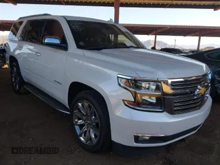 2016 Chevrolet Tahoe LTZ z VIN 1GNSKCKC4GR359442, wystawiony jako IAAI lot #41871814 z przebiegiem 158 533 mil mil oraz . Historia ofert i sprzedaży dostępna na DreamBid. Obrazek 1.