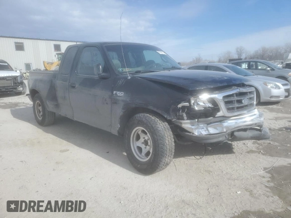 2000 Ford F-150 XL with VIN 1FTZX072XYKA48583, listed as a Copart auction lot 89140115 with Not provided miles and Salvage title. Bid and sale history available at DreamBid. Image 4.