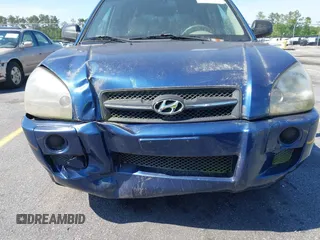 2005 Hyundai Tucson GL with VIN KM8JM12B85U233228, listed as a IAAI auction lot 42051627 with 170,742 mi miles. Bid and sale history available at carsss.com. Image 6.
