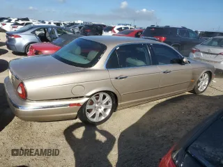 2005 Jaguar XJ with VIN SAJWA79C05SG46913, listed as a Copart auction lot 75092794 with 0 mi miles and Salvage Title. Bid and sale history available at carsss.com. Image 3.