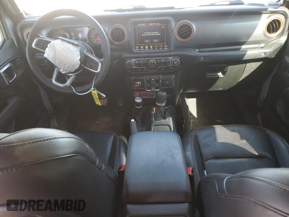 2023 Jeep Gladiator Mojave with VIN 1C6JJTEGXPL547222, listed as a Copart auction lot 52143545 with 28,586 mi miles and Salvage title. Bid and sale history available at DreamBid. Image 8.