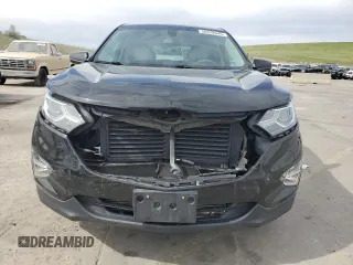 2018 Chevrolet Equinox LT z VIN 2GNAXSEV5J6135619, wystawiony jako Copart lot #56678645 z przebiegiem 77 019 mil mil oraz Szkoda całkowita • Salvage title. Historia ofert i sprzedaży dostępna na DreamBid. Obrazek 5.