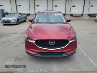 2018 Mazda CX-5 Grand Touring with VIN JM3KFADM8J0444455, listed as a Copart auction lot 59793055 with 60,839 mi miles and Salvage title. Bid and sale history available at DreamBid. Image 5.