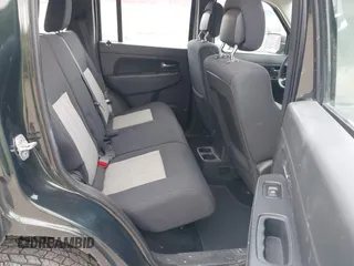 2010 Jeep Liberty Sport with VIN 1J4PN2GK7AW176037, listed as a IAAI auction lot 42125070 with 178,872 mi miles. Bid and sale history available at carsss.com. Image 8.
