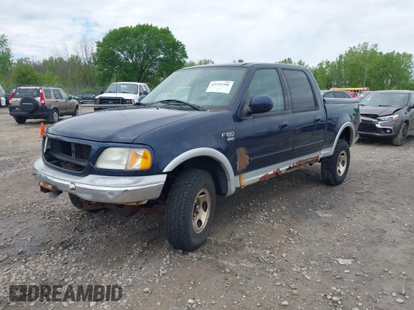 2003 Ford F-150 XLT with VIN 1FTRW08L63KD55851, listed as a IAAI auction lot 42359388 with Not provided miles and . Bid and sale history available at DreamBid. Image 2.