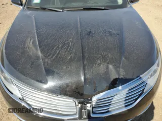 2015 Lincoln MKZ z VIN 3LN6L2GK1FR613074, wystawiony jako Copart lot #52157775 z przebiegiem 118 144 mil mil oraz Szkoda całkowita • Salvage title. Historia ofert i sprzedaży dostępna na DreamBid. Obrazek 13.