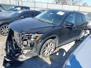 2013 Mazda CX-5 Grand Touring with VIN JM3KE2DE1D0164723, listed as a IAAI auction lot 41364590 with 227,932 mi miles. Bid and sale history available at carsss.com. Image 18.