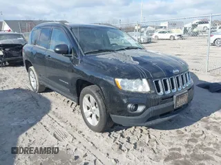 2013 Jeep Compass Sport with VIN 1C4NJCBB2DD250650, listed as a IAAI auction lot 41068228 with 148,549 mi miles. Bid and sale history available at carsss.com. Image 1.