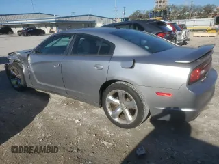 2013 Dodge Charger SXT with VIN 2C3CDXHG0DH612832, listed as a Copart auction lot 47025635 with 117,260 mi miles and Salvage Title. Bid and sale history available at carsss.com. Image 2.