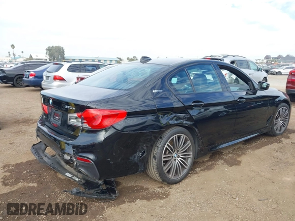 2019 BMW 5 Series 530e with VIN WBAJA9C59KB389304, listed as a IAAI auction lot 41562928 with 64,137 mi miles and . Bid and sale history available at DreamBid. Image 6.