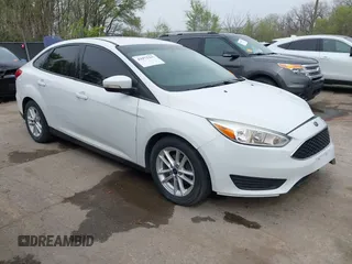2016 Ford Focus SE with VIN 1FADP3F2XGL324613, listed as a IAAI auction lot 41971597 with 126,738 mi miles. Bid and sale history available at carsss.com. Image 1.