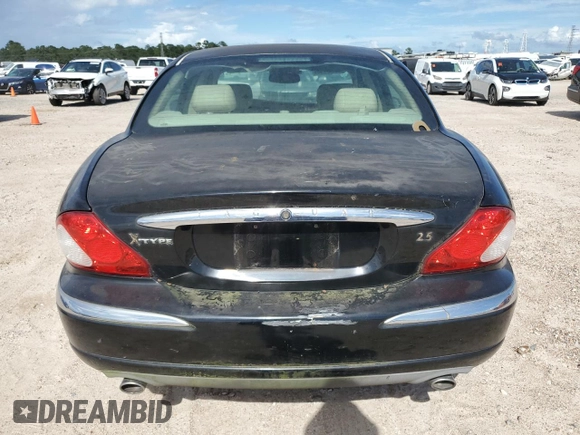 2003 Jaguar X-Type 2.5L Manual z VIN SAJEA51D73XD21289, wystawiony jako Copart lot #59583194 z przebiegiem 70 333 mil mil oraz Czysty tytuł • Clean title. Historia ofert i sprzedaży dostępna na DreamBid. Obrazek 6.