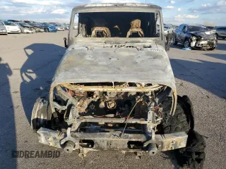2009 Jeep Wrangler Rubicon with VIN 1J4GA64119L762714, listed as a Copart auction lot 80943364 with Not Provided miles and Salvage Title. Bid and sale history available at DreamBid. Image 5.