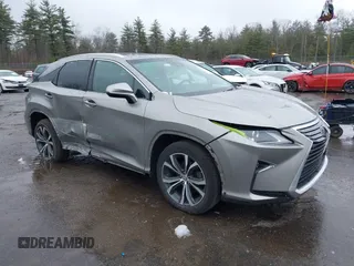 2017 Lexus RX with VIN 2T2BZMCA1HC125449, listed as a IAAI auction lot 41966133 with 102,788 mi miles. Bid and sale history available at carsss.com. Image 1.