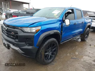 2023 Chevrolet Colorado 4WD Trail Boss with VIN 1GCPTEEK3P1208942, listed as a IAAI auction lot 41475026 with 11,576 mi miles. Bid and sale history available at carsss.com. Image 2.