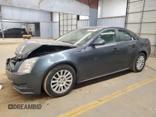 2012 Cadillac CTS z VIN 1G6DA5E5XC0121948, wystawiony jako Copart lot #87022874 z przebiegiem Nie podano mil oraz Szkoda całkowita • Salvage title. Historia ofert i sprzedaży dostępna na DreamBid. Obrazek 1.