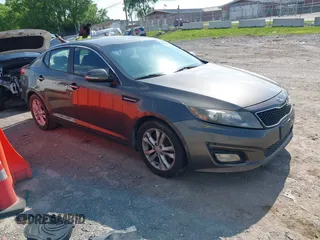 2012 Kia Optima EX with VIN 5XXGN4A79CG075818, listed as a IAAI auction lot 42151671 with 87,645 mi miles. Bid and sale history available at carsss.com. Image 1.