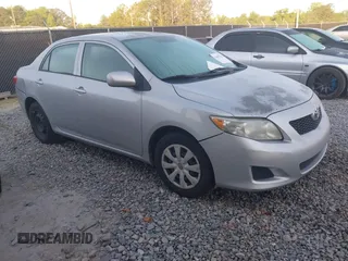2010 Toyota Corolla with VIN 1NXBU4EE6AZ320115, listed as a IAAI auction lot 42069282 with 183,905 mi miles. Bid and sale history available at carsss.com. Image 1.