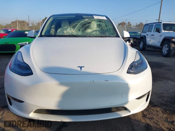 2021 Tesla Model Y Performance with VIN 5YJYGDEF2MF258711, listed as a IAAI auction lot 41367832 with 47,662 mi miles and . Bid and sale history available at DreamBid. Image 12.