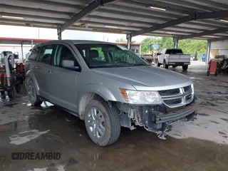 2014 Dodge Journey SE with VIN 3C4PDCAB1ET194066, listed as a IAAI auction lot 42117527 with 184,490 mi miles and . Bid and sale history available at carsss.com. Image 1.