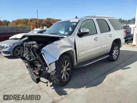 2011 GMC Yukon Denali with VIN 1GKS2EEF5BR338669, listed as a Copart auction lot 76604324 with 156,641 mi miles and Salvage Title. Bid and sale history available at DreamBid. Image 1.
