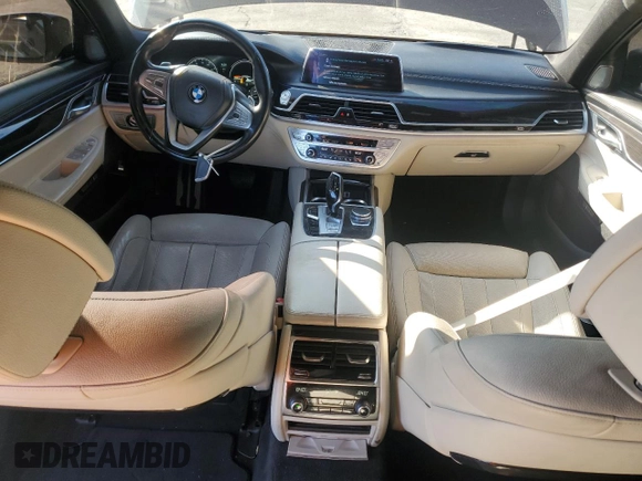 2016 BMW 7 Series 740i с VIN WBA7E2C54GG504200, выставлен на аукционе Copart как лот 46369885 с пробегом 70 606 миль миль и Списание • Salvage title. История ставок и продаж доступна на DreamBid. Изображение 8.
