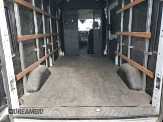 2021 Ford Transit Cargo z VIN 1FTBR1X84MKA46389, wystawiony jako Copart lot #58608695 z przebiegiem 72 951 mil mil oraz Szkody całkowita. Historia ofert i sprzedaży dostępna na DreamBid. Obrazek 10.