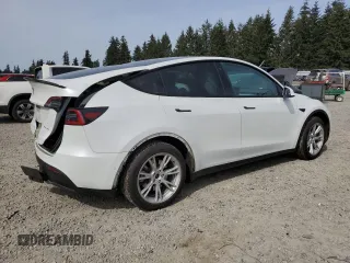 2020 Tesla Model Y Long Range with VIN 5YJYGDEF2LF006357, listed as a Copart auction lot 54888215 with 55,983 mi miles and Salvage Title. Bid and sale history available at DreamBid. Image 3.