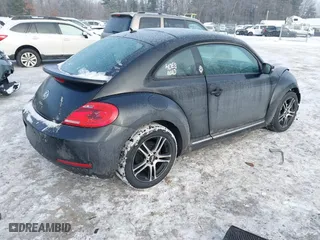 2012 Volkswagen Beetle 2.5L PZEV with VIN 3VWJP7AT8CM619137, listed as a IAAI auction lot 41195954 with 157,741 mi miles. Bid and sale history available at carsss.com. Image 4.