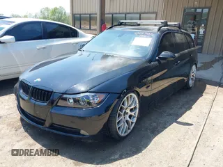 2007 BMW 3 Series 328i with VIN WBAVS13527FX15900, listed as a IAAI auction lot 42047413 with 159,249 mi miles. Bid and sale history available at carsss.com. Image 2.