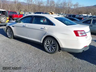2013 Ford Taurus Limited with VIN 1FAHP2F82DG131585, listed as a IAAI auction lot 41076163 with 134,916 mi miles. Bid and sale history available at carsss.com. Image 3.