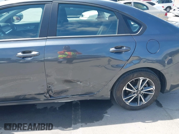 2023 Kia Forte LXS with VIN 3KPF24AD7PE634209, listed as a IAAI auction lot 42046423 with 37,542 mi miles and . Bid and sale history available at DreamBid. Image 6.