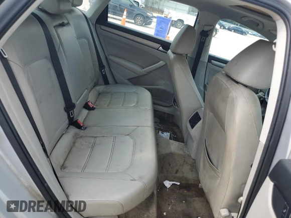 2014 Volkswagen Passat SE with VIN 1VWBT7A36EC047828, listed as a Copart auction lot 63711855 with 204,196 mi miles and Clean title. Bid and sale history available at DreamBid. Image 10.