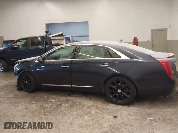 2013 Cadillac XTS Luxury with VIN 2G61P5S34D9200849, listed as a IAAI auction lot 41412189 with 134,932 mi miles. Bid and sale history available at carsss.com. Image 14.