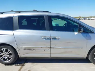 2012 Honda Odyssey EX with VIN 5FNRL5H48CB131881, listed as a IAAI auction lot 41822159 with 354,718 mi miles and . Bid and sale history available at DreamBid. Image 13.
