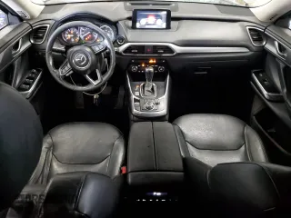 2017 Mazda CX-9 Touring with VIN JM3TCBCY5H0134295, listed as a Copart auction lot 63448185 with 174,248 mi miles and Salvage title. Bid and sale history available at DreamBid. Image 8.