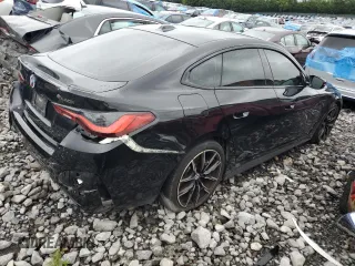 2023 BMW 4 Series M440i with VIN WBA63AW04PFP17973, listed as a Copart auction lot 63539124 with 23,425 mi miles and Salvage title. Bid and sale history available at DreamBid. Image 3.