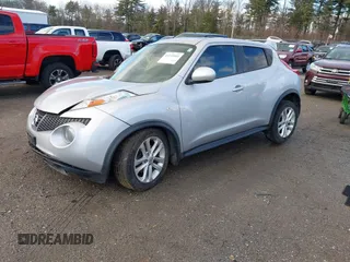 2014 Nissan Juke S with VIN JN8AF5MV8ET363145, listed as a IAAI auction lot 41210984 with 113,268 mi miles. Bid and sale history available at carsss.com. Image 2.