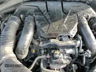 2023 Genesis GV70 Sport with VIN KMUMCDTC9PU090500, listed as a Copart auction lot 68619035 with 94,518 mi miles and Salvage title. Bid and sale history available at DreamBid. Image 17.