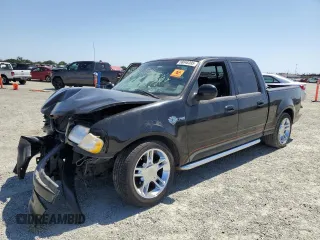 2001 Ford F-150 XLT with VIN 1FTRW07LX1KB47311, listed as a Copart auction lot 58848395 with Not provided miles and Salvage title. Bid and sale history available at DreamBid. Image 1.
