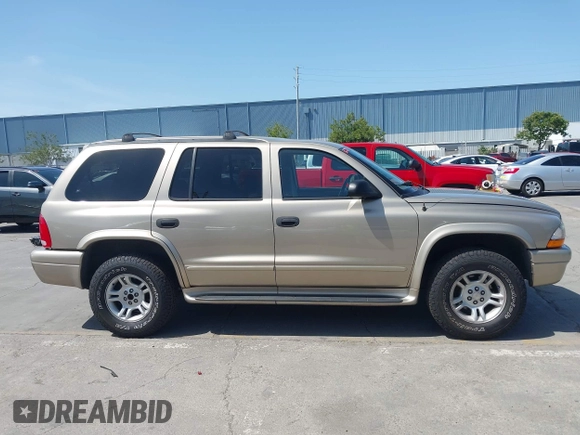 2003 Dodge Durango SLT z VIN 1D4HS48N43F517701, wystawiony jako IAAI lot #42277135 z przebiegiem 135 521 mil mil oraz . Historia ofert i sprzedaży dostępna na DreamBid. Obrazek 13.