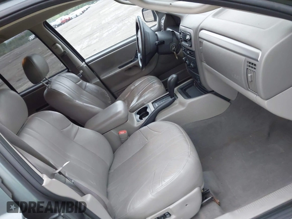 2004 Jeep Grand Cherokee Laredo with VIN 1J4GW48S24C276284, listed as a IAAI auction lot 42596655 with 142,524 mi miles and . Bid and sale history available at DreamBid. Image 5.