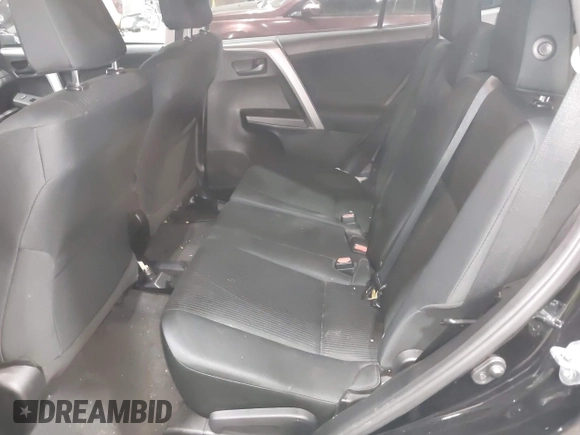 2017 Toyota RAV4 LE with VIN 2T3BFREV8HW571887, listed as a IAAI auction lot 41612815 with 100,742 mi miles and . Bid and sale history available at DreamBid. Image 8.