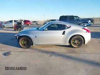 2014 Nissan 370Z Nismo with VIN JN1AZ4EH4EM634236, listed as a IAAI auction lot 41256664 with 80,294 mi miles and . Bid and sale history available at DreamBid. Image 13.
