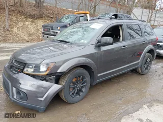 2019 Dodge Journey SE with VIN 3C4PDCBB2KT798896, listed as a IAAI auction lot 41635698 with 65,367 mi miles. Bid and sale history available at carsss.com. Image 17.