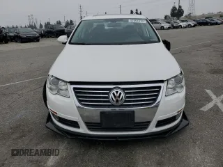 2008 Volkswagen Passat z VIN WVWCU73C58P028217, wystawiony jako Copart lot #52451275 z przebiegiem 70 829 mil mil oraz Szkoda całkowita • Salvage title. Historia ofert i sprzedaży dostępna na DreamBid. Obrazek 5.